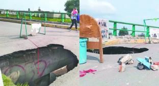 Inundación dejó un boquete en puente de Calixtlahuaca, en Toluca. Noticias en tiempo real