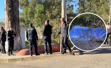 Hallan cuerpo flotando en Canal de Chalco junto a ropa y una lata de cerveza