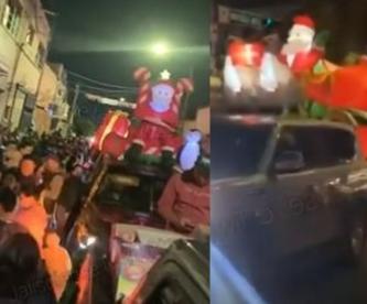 VIDEO: Integrantes del CJNG arman desfile navideño y reparten regalos, en Jalisco