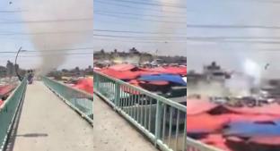Tornado de polvo ataca tianguis de Santa Martha Acatitla, en Iztapalapa . Noticias en tiempo real
