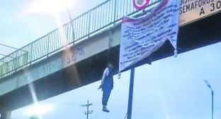 Hallan maniquí y manta con mensaje intimidatorio en puente peatonal de Iztapalapa . Noticias en tiempo real