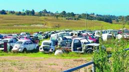 Cementerio de autos chatarra genera molestia a vecinos de San Pablo Autopan