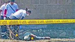 En Jojutla encuentran cuerpo de 'chapulín' con disparos y mensaje de amenaza