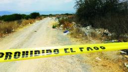 Hallan cadáver de taxista desaparecido, entre desperdicios, en Querétaro