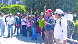 Activistas y familiares protestan por los defensores del agua, en Toluca