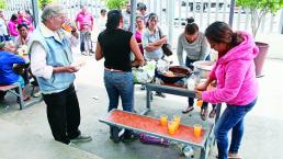 Familia prepara y regala alimentos en hospitales de Querétaro