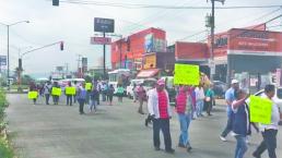 Transportistas nuevamente causan caos vial con protesta, en Cuernavaca