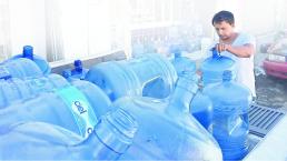 Distribuidores de agua aumentan ganancias tras el corte del suministro