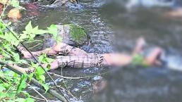 Vendedor de nieves aparece flotando en canal de agua, en Xochitepec