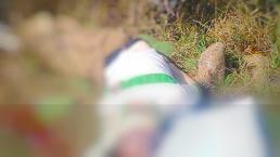 Encuentran cadáver con signos de tortura en campo de Irapuato