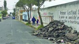 reparación, olvidan montalas de asfalto, Toluca