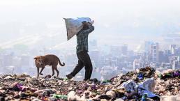 Montaña de basura Ciudad más contaminada India Taj Mahal