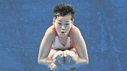 Campeona olímpica de China rechaza dinero, casa y tratamiento médico para su madre