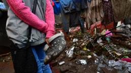 Afectados por inundación en Ecatepec piden que militares saquen basura y agua para limpiar