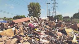 Denuncian tiradero ilegal para muebles inservibles y basura, tras inundaciones en Ecatepec