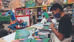 Artesanos de Iztapalapa se preparan para mostrar su arte en el desfile de Día de Muertos