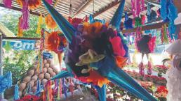 Familia de Morelos ha salido adelante gracias al éxito de sus artesanales piñatas