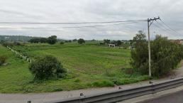 Campesinos encuentran cadáver putrefacto sembrado en un terreno, en el Edomex