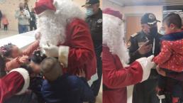 Santa Claus lleva la Navidad a los niños de las mamá recluidas en el penal de Santa Martha
