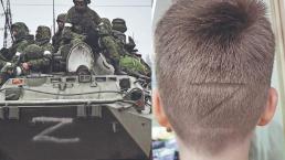 Mamá le rapa la cabeza a su hijo de 10 años, en apoyo al ejército ruso