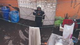 Por falta de mantenimiento en drenaje, vecinos de Tláhuac llevan 12 años con inundaciones