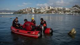 Buzos de la Marina ayudan a buscar restos de tripulantes desaparecidos tras Otis