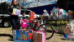 La SSC hace emotiva entrega de regalos a niños de la fundación 'Aquí nadie se rinde'