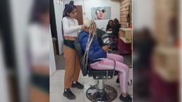 VIDEO: Mujer se quiere ir sin pagar, pero estilista la rapa 