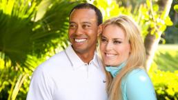 Tiger Woods posando al lado de su novia, Lindsey Vonn
